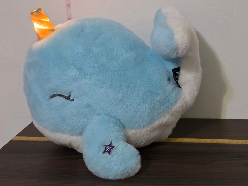 FAO Schwarz "Glow Brights" light-up narwhal plush